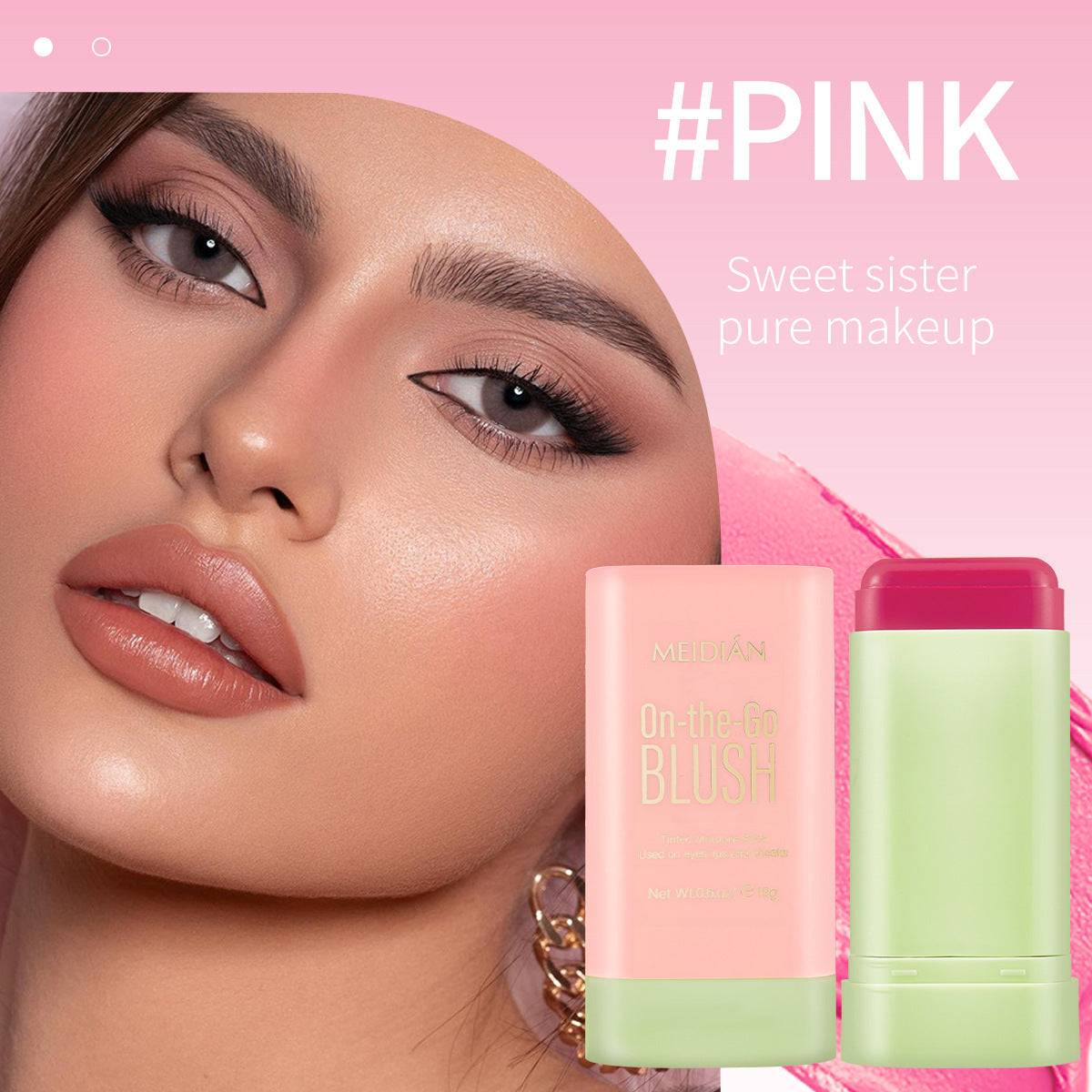 Model showcasing pink On-the-Go Blush with radiant skin and bold makeup, emphasizing a fresh look.